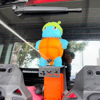 Sprühfigurine Auto — Ein Wasserstrahl, der lächelt 